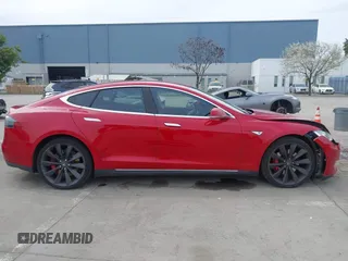 2015 Tesla Model S 85D with VIN 5YJSA1H42FF086599, listed as a IAAI auction lot 41832223 with 67,671 mi miles. Bid and sale history available at carsss.com. Image 13.