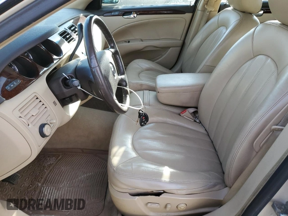 2010 Buick Lucerne CXL Premium with VIN 1G4HJ5EM0AU129841, listed as a Copart auction lot 48680685 with 140,017 mi miles and Salvage Title. Bid and sale history available at DreamBid. Image 7.