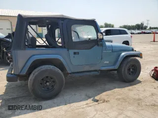 1999 Jeep Wrangler SE with VIN 1J4FY29P0XP422425, listed as a Copart auction lot 60513335 with Not provided miles and Clean title. Bid and sale history available at DreamBid. Image 3.