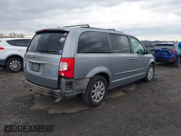 2014 Chrysler Town & Country Touring with VIN 2C4RC1BG1ER343069, listed as a IAAI auction lot 41683253 with 137,978 mi miles and . Bid and sale history available at DreamBid. Image 4.