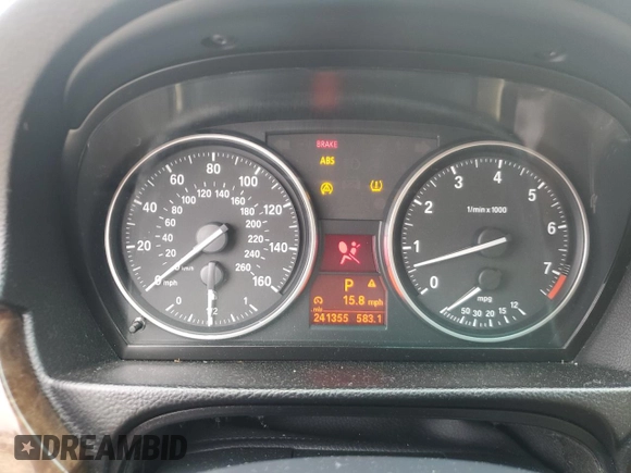 2009 BMW 3 Series 328i with VIN WBAPH77599NM31774, listed as a Copart auction lot 52669315 with 241,355 mi miles and Salvage title. Bid and sale history available at DreamBid. Image 9.