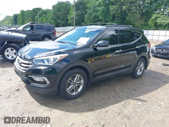 2017 Hyundai Santa Fe 2.4L z VIN 5NMZU3LB5HH043545, wystawiony jako IAAI lot #42244550 z przebiegiem 84 464 mil mil oraz . Historia ofert i sprzedaży dostępna na DreamBid. Obrazek 2.