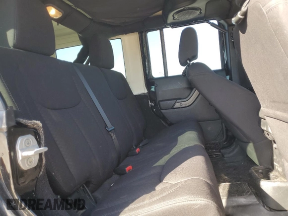 2013 Jeep Wrangler Unlimited Freedom z VIN 1C4BJWDG0DL513902, wystawiony jako Copart lot #52045975 z przebiegiem 166 827 mil mil oraz Szkoda całkowita • Salvage title. Historia ofert i sprzedaży dostępna na DreamBid. Obrazek 10.