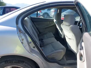 2004 Oldsmobile Alero GL1 z VIN 1G3NL52E54C196878, wystawiony jako IAAI lot #42357662 z przebiegiem Nie podano mil oraz . Historia ofert i sprzedaży dostępna na DreamBid. Obrazek 8.