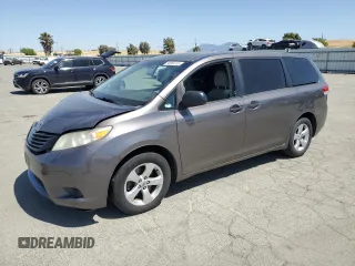 2012 Toyota Sienna with VIN 5TDZK3DC0CS190388, listed as a Copart auction lot 58564315 with 256,936 mi miles and Salvage title. Bid and sale history available at DreamBid. Image 1.