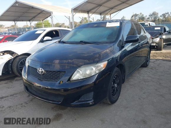 2009 Toyota Corolla with VIN 1NXBU40E19Z128054, listed as a IAAI auction lot 42085620 with 109,702 mi miles. Bid and sale history available at carsss.com. Image 2.