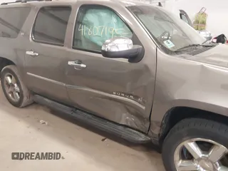 2012 Chevrolet Suburban LTZ with VIN 1GNSKKE79CR180400, listed as a IAAI auction lot 41807195 with 154,410 mi miles and . Bid and sale history available at carsss.com. Image 6.