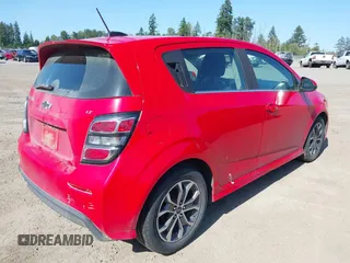 2018 Chevrolet Sonic LT with VIN 1G1JD6SB6J4114615, listed as a IAAI auction lot 42276337 with 132,798 mi miles and . Bid and sale history available at DreamBid. Image 4.