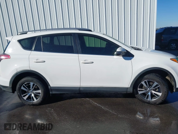 2018 Toyota RAV4 XLE with VIN JTMWFREV7JJ743297, listed as a IAAI auction lot 41579019 with 102,442 mi miles. Bid and sale history available at carsss.com. Image 13.