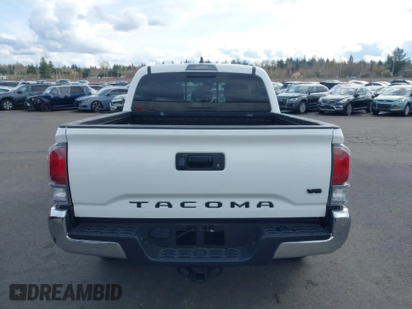 2023 Toyota Tacoma SR z VIN 3TMCZ5AN0PM541700, wystawiony jako IAAI lot #41819408 z przebiegiem 14 216 mil mil oraz . Historia ofert i sprzedaży dostępna na DreamBid. Obrazek 17.