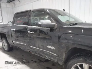 2016 Chevrolet Silverado 1500 High Country with VIN 3GCUKTEC8GG221707, listed as a IAAI auction lot 41587628 with 63,740 mi miles and . Bid and sale history available at DreamBid. Image 6.