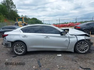 2019 Infiniti Q50 Luxe z VIN JN1EV7AP6KM512713, wystawiony jako IAAI lot #42151445 z przebiegiem Nie podano mil oraz . Historia ofert i sprzedaży dostępna na DreamBid. Obrazek 13.