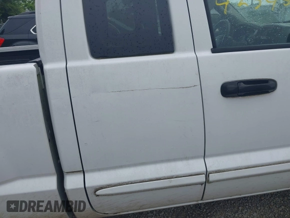 2005 Dodge Dakota SLT with VIN 1D7HW42N75S213191, listed as a IAAI auction lot 42345554 with 152,833 mi miles and . Bid and sale history available at DreamBid. Image 14.