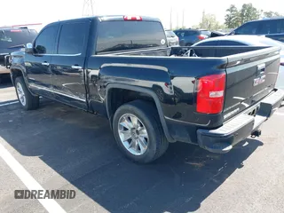 2014 GMC Sierra 1500 Denali z VIN 3GTU2WEC2EG302474, wystawiony jako IAAI lot #41881222 z przebiegiem 197 221 mil mil oraz . Historia ofert i sprzedaży dostępna na DreamBid. Obrazek 3.