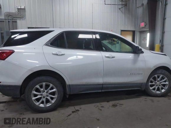 2019 Chevrolet Equinox LT z VIN 2GNAXUEV2K6258730, wystawiony jako IAAI lot #41429824 z przebiegiem 72 435 mil mil oraz . Historia ofert i sprzedaży dostępna na DreamBid. Obrazek 13.