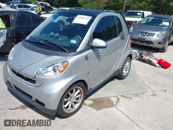 2008 Smart fortwo Pure with VIN WMEEJ31X68K106096, listed as a IAAI auction lot 42456471 with 92,074 mi miles and . Bid and sale history available at DreamBid. Image 2.