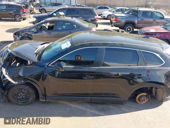 2018 Mazda CX-9 Sport with VIN JM3TCBBY6J0222750, listed as a IAAI auction lot 42294464 with 63,927 mi miles and . Bid and sale history available at DreamBid. Image 14.