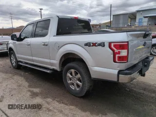 2018 Ford F-150 XL with VIN 1FTEW1E57JKC62666, listed as a Copart auction lot 61619235 with 149,759 mi miles and Clean title. Bid and sale history available at DreamBid. Image 2.