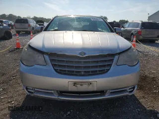 2009 Chrysler Sebring Touring z VIN 1C3LC55D89N501090, wystawiony jako Copart lot #54007345 z przebiegiem 111 381 mil mil oraz Szkody całkowita. Historia ofert i sprzedaży dostępna na DreamBid. Obrazek 5.