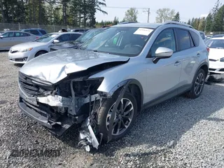 2016 Mazda CX-5 Grand Touring with VIN JM3KE4DYXG0647802, listed as a IAAI auction lot 41996854 with 85,774 mi miles. Bid and sale history available at carsss.com. Image 17.