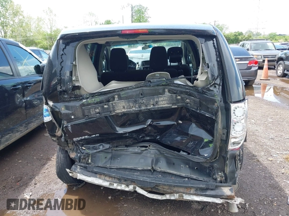 2017 Dodge Grand Caravan SE z VIN 2C4RDGBG0HR605507, wystawiony jako IAAI lot #42168499 z przebiegiem 169 422 mil mil oraz . Historia ofert i sprzedaży dostępna na DreamBid. Obrazek 6.