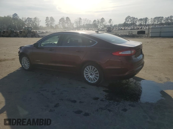 2015 Ford Fusion SE Hybrid with VIN 3FA6P0LUXFR210883, listed as a Copart auction lot 51279985 with 233,341 mi miles and Salvage Title. Bid and sale history available at carsss.com. Image 2.