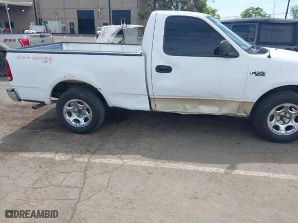1999 Ford F-150 Work Series with VIN 2FTZF1729XCA83871, listed as a IAAI auction lot 42009506 with 234,988 mi miles. Bid and sale history available at carsss.com. Image 6.