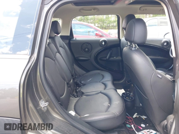 2014 MINI Countryman S with VIN WMWZC3C58EWP27041, listed as a IAAI auction lot 42082489 with 77,749 mi miles and . Bid and sale history available at DreamBid. Image 8.