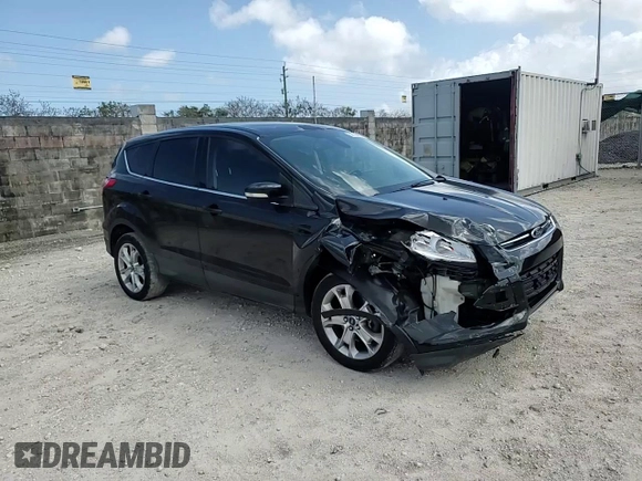 2013 Ford Escape SEL with VIN 1FMCU9H99DUD79003, listed as a Copart auction lot 51126005 with 104,151 mi miles and Clean Title. Bid and sale history available at DreamBid. Image 11.