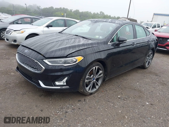 2019 Ford Fusion Titanium with VIN 3FA6P0D92KR125864, listed as a IAAI auction lot 42425422 with 109,340 mi miles and . Bid and sale history available at DreamBid. Image 17.