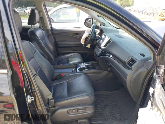 2017 Honda Pilot Touring with VIN 5FNYF5H91HB038268, listed as a IAAI auction lot 42786448 with 62,195 mi miles and . Bid and sale history available at DreamBid. Image 5.