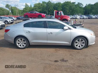 2012 Buick LaCrosse Premium 1 z VIN 1G4GD5E33CF181997, wystawiony jako IAAI lot #42411613 z przebiegiem 59 246 mil mil oraz . Historia ofert i sprzedaży dostępna na DreamBid. Obrazek 13.