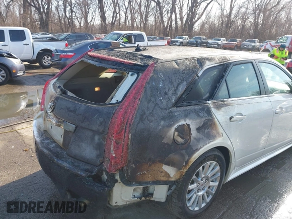 2014 Cadillac CTS with VIN 1G6DF8E5XE0183162, listed as a IAAI auction lot 41114569 with 66,484 mi miles and . Bid and sale history available at DreamBid. Image 6.