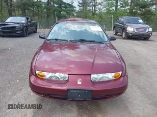 2001 Saturn SL z VIN 1G8ZH52841Z331770, wystawiony jako IAAI lot #42136194 z przebiegiem 70 798 mil mil oraz . Historia ofert i sprzedaży dostępna na DreamBid. Obrazek 12.