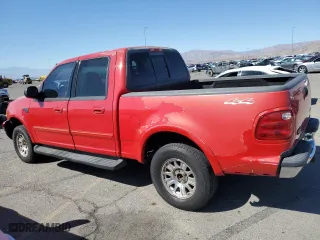 2001 Ford F-150 SuperCrew XLT with VIN 1FTRW08L51KE67795, listed as a Copart auction lot 75872894 with 0 mi miles and Salvage Title. Bid and sale history available at carsss.com. Image 2.