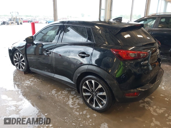 2019 Mazda CX-3 Touring z VIN JM1DKDC70K0404219, wystawiony jako IAAI lot #42148454 z przebiegiem 80 539 mil mil oraz . Historia ofert i sprzedaży dostępna na DreamBid. Obrazek 3.