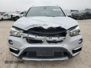 2018 BMW X1 sDrive28i with VIN WBXHU7C32J5L05237, listed as a Copart auction lot 51523905 with 75,638 mi miles and Salvage Title. Bid and sale history available at carsss.com. Image 5.