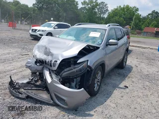 2019 Jeep Cherokee Latitude Plus with VIN 1C4PJLLB3KD184842, listed as a IAAI auction lot 42389142 with 123,324 mi miles and . Bid and sale history available at DreamBid. Image 2.