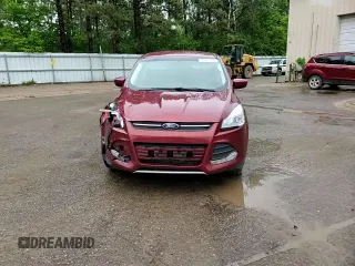 2016 Ford Escape SE z VIN 1FMCU0G9XGUB59807, wystawiony jako Copart lot #57920065 z przebiegiem 124 482 mil mil oraz Szkoda całkowita • Salvage title. Historia ofert i sprzedaży dostępna na DreamBid. Obrazek 13.