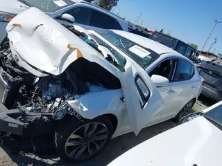 2015 Kia Optima SX Turbo with VIN 5XXGR4A67FG517902, listed as a IAAI auction lot 41629985 with 1 mi miles. Bid and sale history available at carsss.com. Image 2.