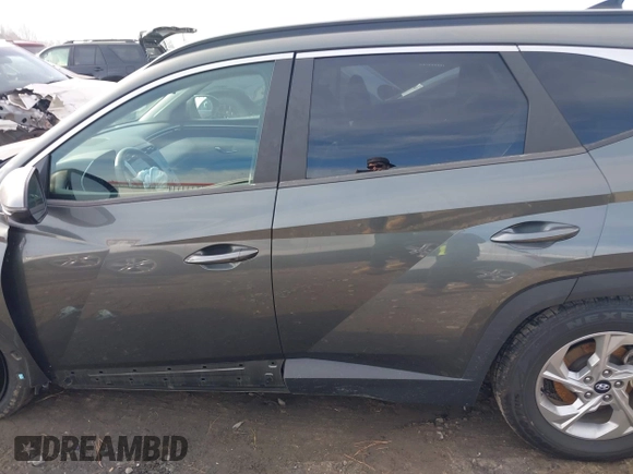 2022 Hyundai Tucson SEL with VIN 5NMJBCAEXNH031855, listed as a IAAI auction lot 41677386 with 40,606 mi miles and . Bid and sale history available at DreamBid. Image 15.