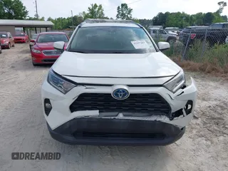 2020 Toyota RAV4 Hybrid XLE z VIN 2T3RWRFV7LW072553, wystawiony jako IAAI lot #42197281 z przebiegiem 166 115 mil mil oraz . Historia ofert i sprzedaży dostępna na DreamBid. Obrazek 12.