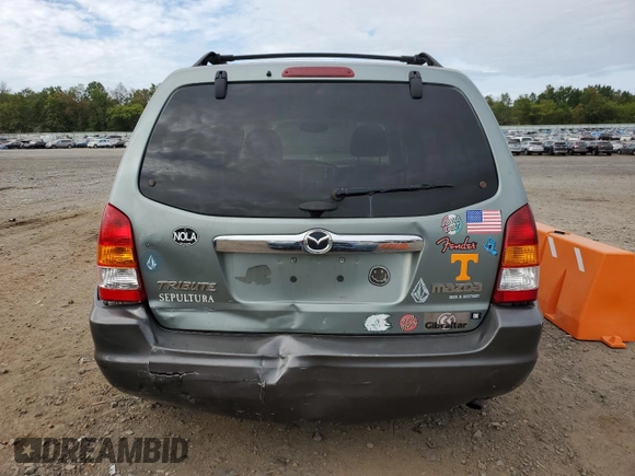 2003 Mazda Tribute LX with VIN 4F2YZ94123KM49852, listed as a Copart auction lot 71779054 with 263,938 mi miles and Salvage Title. Bid and sale history available at carsss.com. Image 6.