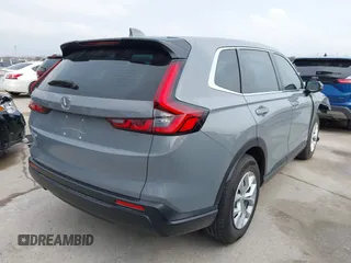 2024 Honda CR-V LX with VIN 2HKRS3H24RH318065, listed as a IAAI auction lot 41703836 with 16,810 mi miles and . Bid and sale history available at DreamBid. Image 4.