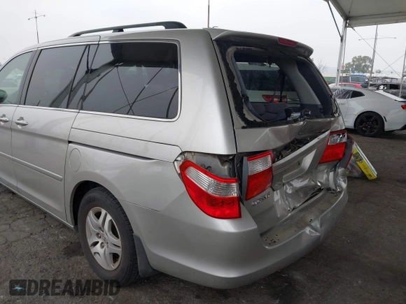 2007 Honda Odyssey EX with VIN 5FNRL38477B432832, listed as a IAAI auction lot 42153673 with 133,652 mi miles and . Bid and sale history available at DreamBid. Image 12.