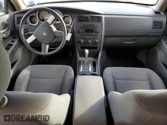 2005 Dodge Magnum SXT z VIN 2D4GZ48VX5H644848, wystawiony jako Copart lot #87614515 z przebiegiem 146 577 mil mil oraz Nie do naprawy • Non repairable. Historia ofert i sprzedaży dostępna na DreamBid. Obrazek 8.