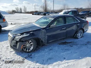 2015 Cadillac CTS Luxury AWD with VIN 1G6AX5SX5F0142864, listed as a Copart auction lot 44492445 with 87,199 mi miles and Salvage Title. Bid and sale history available at DreamBid. Image 1.