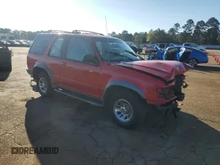 1999 Ford Explorer with VIN 1FMYU22E5XUC72067, listed as a Copart auction lot 79531894 with 109,134 mi miles and Salvage title. Bid and sale history available at DreamBid. Image 4.