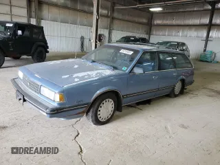 1989 Chevrolet Celebrity z VIN 1G1AW81R2K6232509, wystawiony jako Copart lot #55310485 z przebiegiem 84 848 mil mil oraz Tytuł czysty. Historia ofert i sprzedaży dostępna na DreamBid. Obrazek 1.