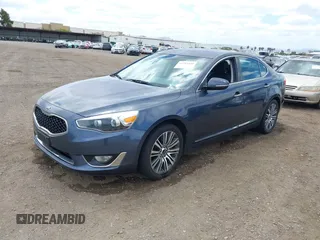 2014 Kia Cadenza Premium z VIN KNALN4D77E5145153, wystawiony jako IAAI lot #42265439 z przebiegiem 65 154 mil mil oraz . Historia ofert i sprzedaży dostępna na DreamBid. Obrazek 2.